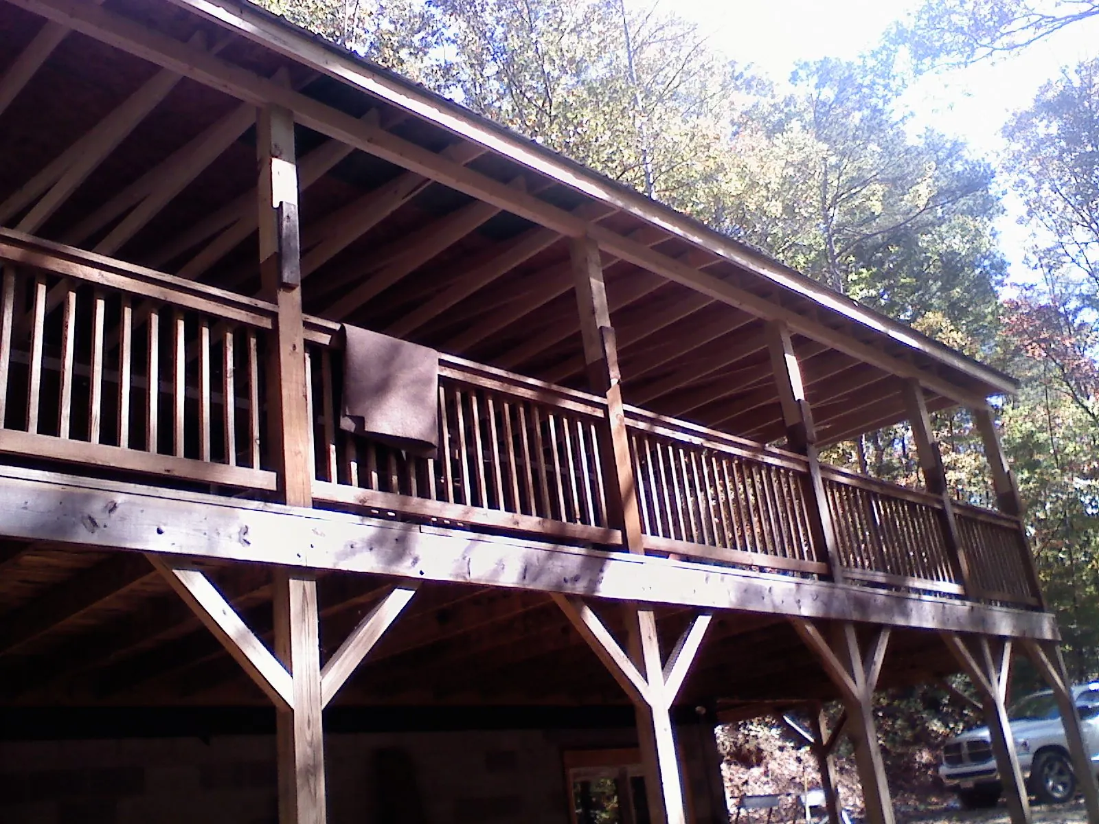 Timber framing under a new elevated porch and deck — Roof Leak Repair in Glenwood Springs by Roofing Brothers